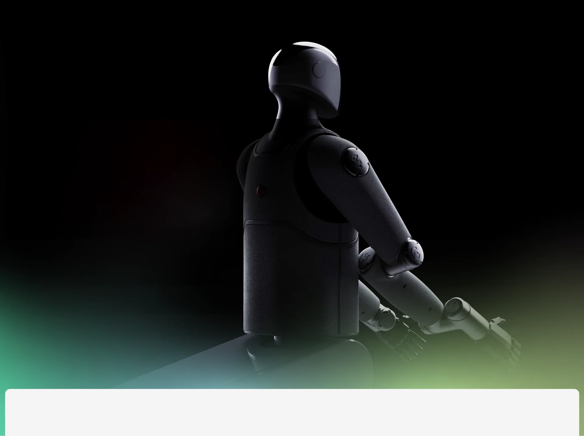 MARK One seen from behind in the dark, glowing green and violet at its base